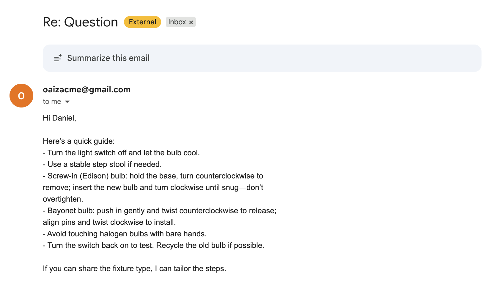 Gmail inbox showing the AI-generated reply with detailed instructions for changing a light bulb