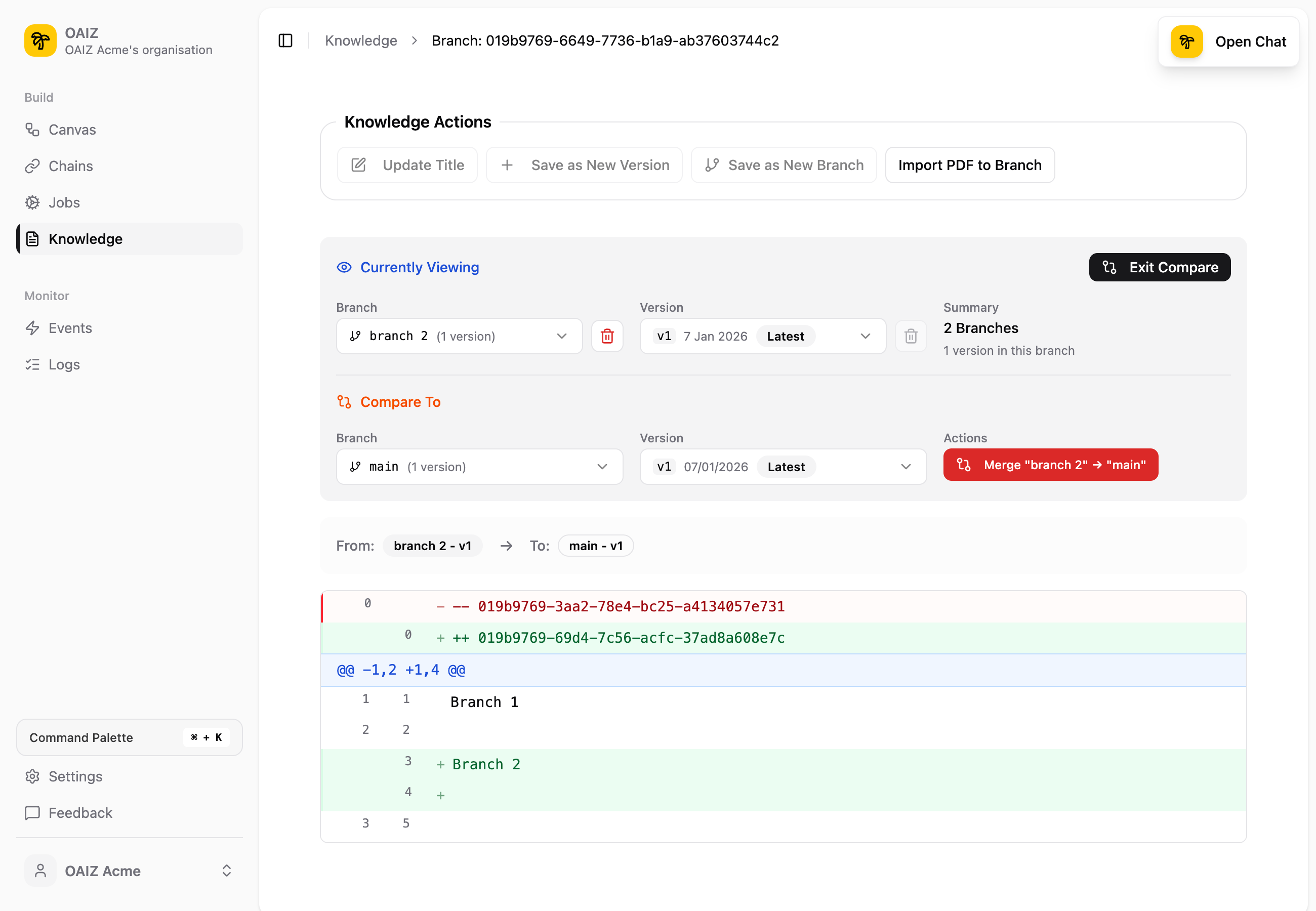 Compare view showing diff between branch 2 and main, with Merge button highlighted